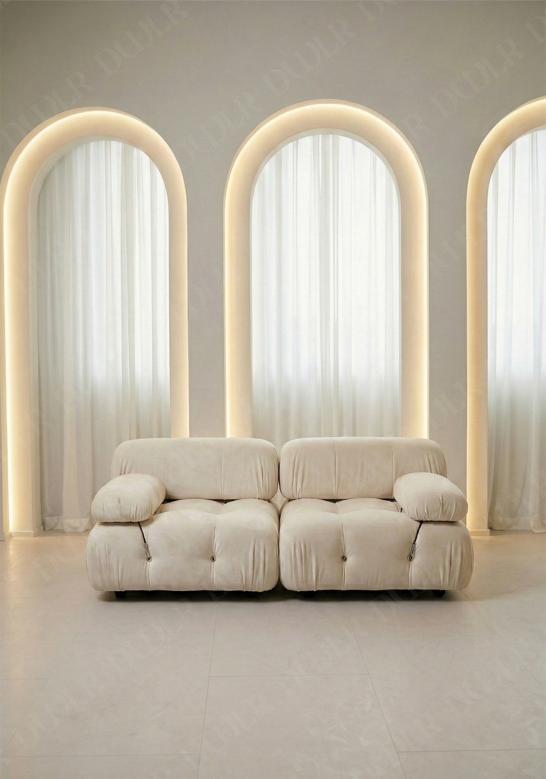 2 seater Cierra modular sofa in off white   velvet  upholstery with plush cushioned seats and modular sectional design