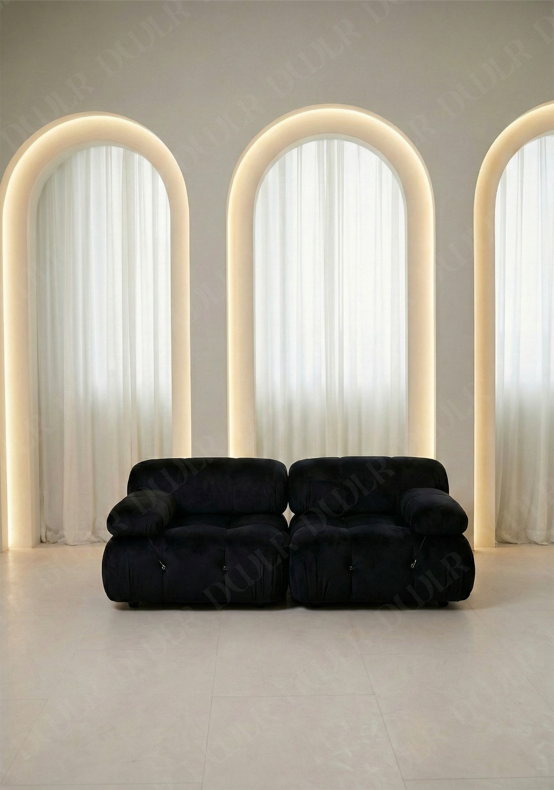 2 seater Cierra modular sofa in black  velvet  upholstery with plush cushioned seats and modular sectional design
