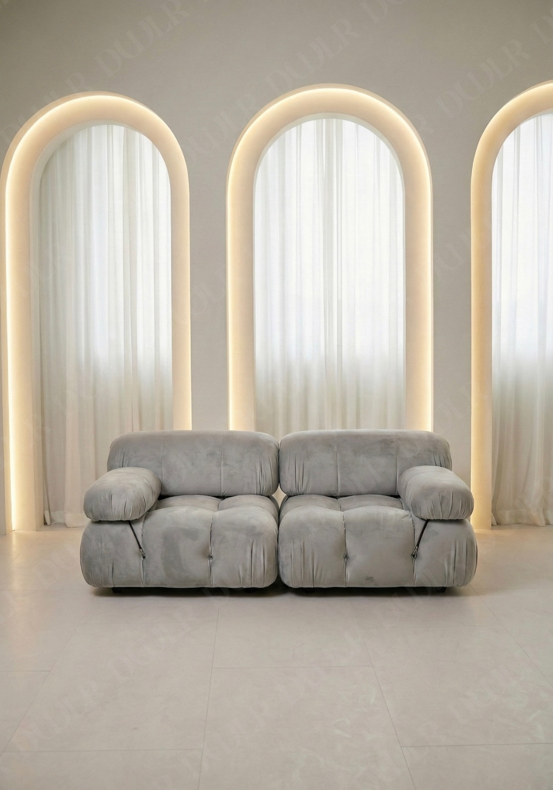 2 seater Cierra modular sofa in light grey velvet  upholstery with plush cushioned seats and modular sectional design