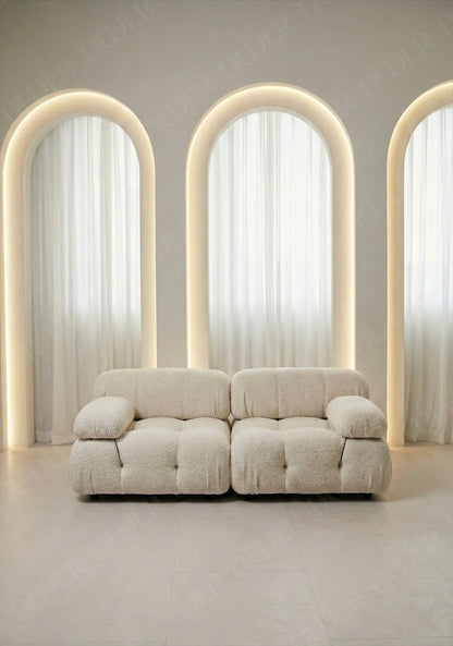 2 seater Cierra modular sofa in off white  boucle upholstery with plush cushioned seats and modular sectional design