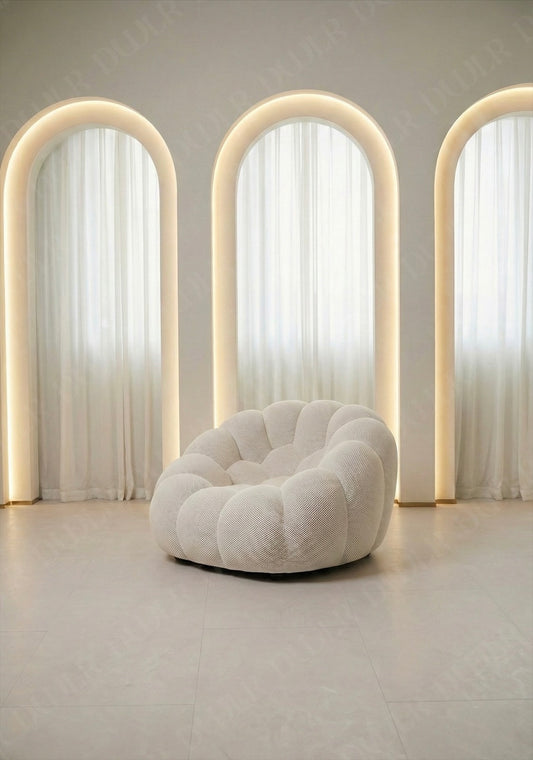 Benna Cloud Chair in white mesh upholstery with plush, rounded cushions

