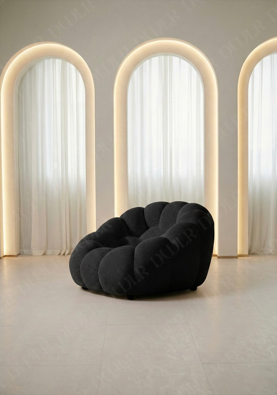 Benna Cloud Chair in black mesh upholstery with plush, rounded cushions
