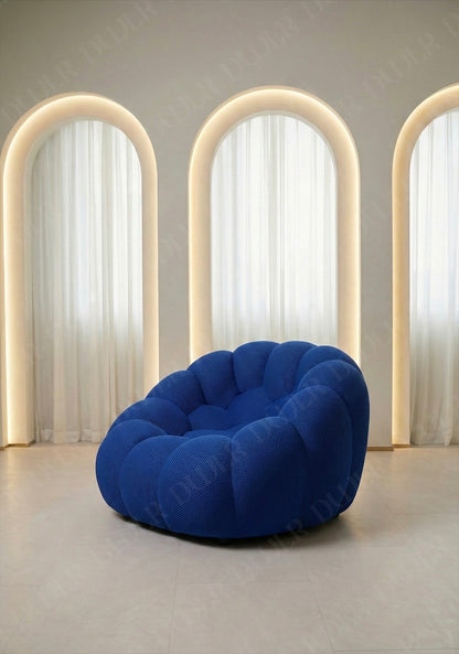 Benna Cloud Chair in blue mesh upholstery with plush, rounded cushions
