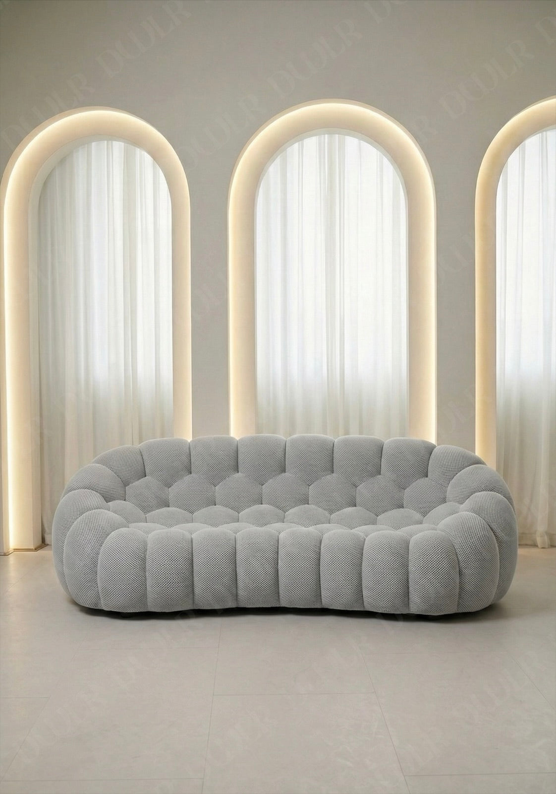 Benna Cloud Sofa in light grey mesh upholstery with rounded, cushioned silhouette