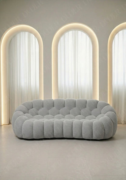 Benna Cloud Sofa in light grey mesh upholstery with rounded, cushioned silhouette