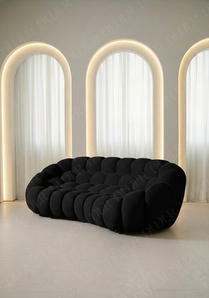 Benna Cloud Sofa in black mesh upholstery with rounded, cushioned silhouette