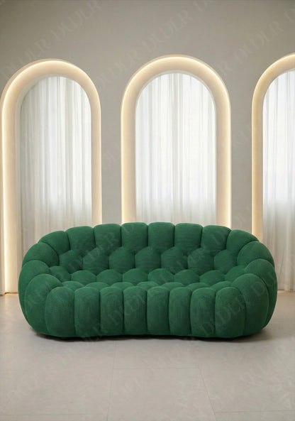 Benna Cloud Sofa in green mesh upholstery with rounded, cushioned silhouette