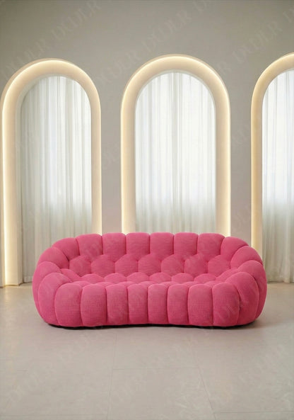 Benna Cloud Sofa in pink mesh upholstery with rounded, cushioned silhouette