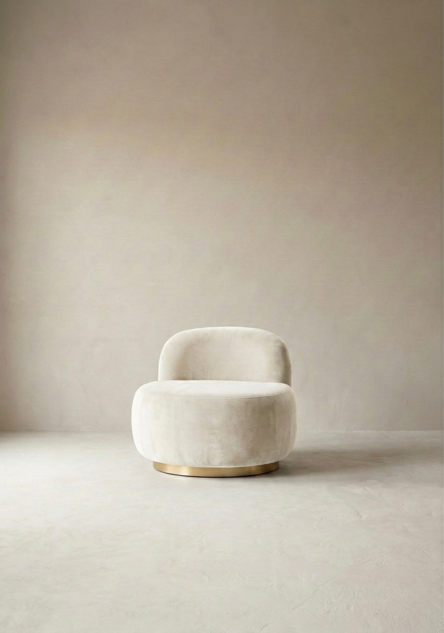 Modern chair with curved backrest in a minimalistic room with light-coloured walls and floor.