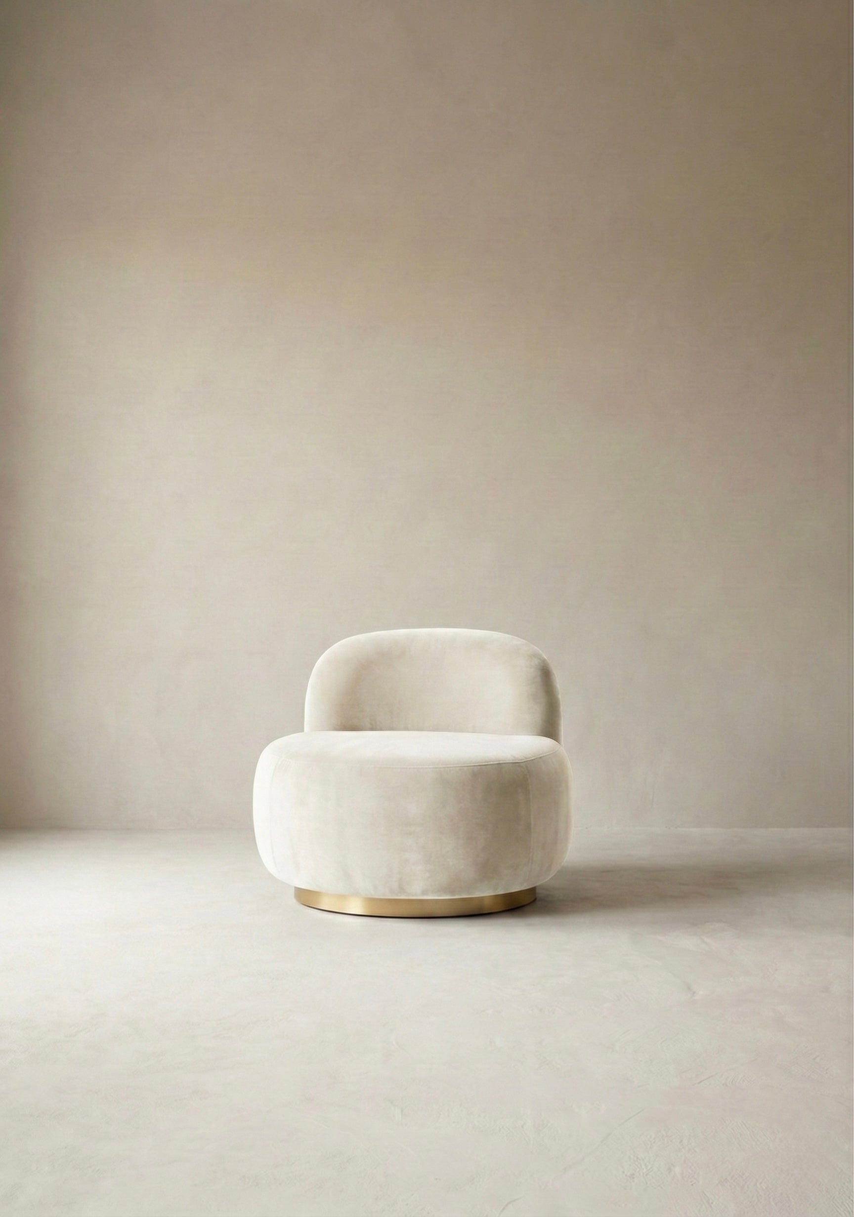 Modern chair with curved backrest in a minimalistic room with light-coloured walls and floor.