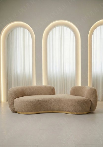 Bera sofa in beige boucle upholstery with curved silhouette and low profile design, without integrated side table