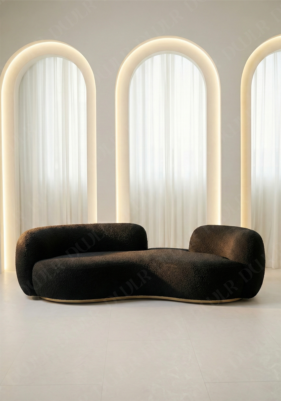 Bera sofa in black boucle upholstery with curved silhouette and low profile design, without integrated side table