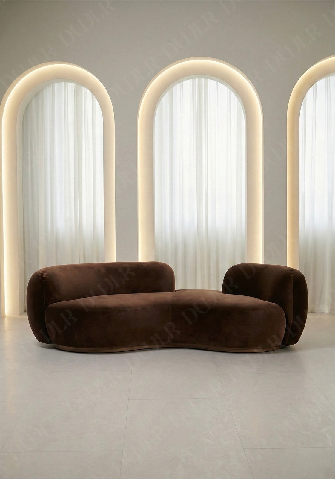 Bera sofa in brown velvet upholstery with curved silhouette and low profile design, without integrated side table