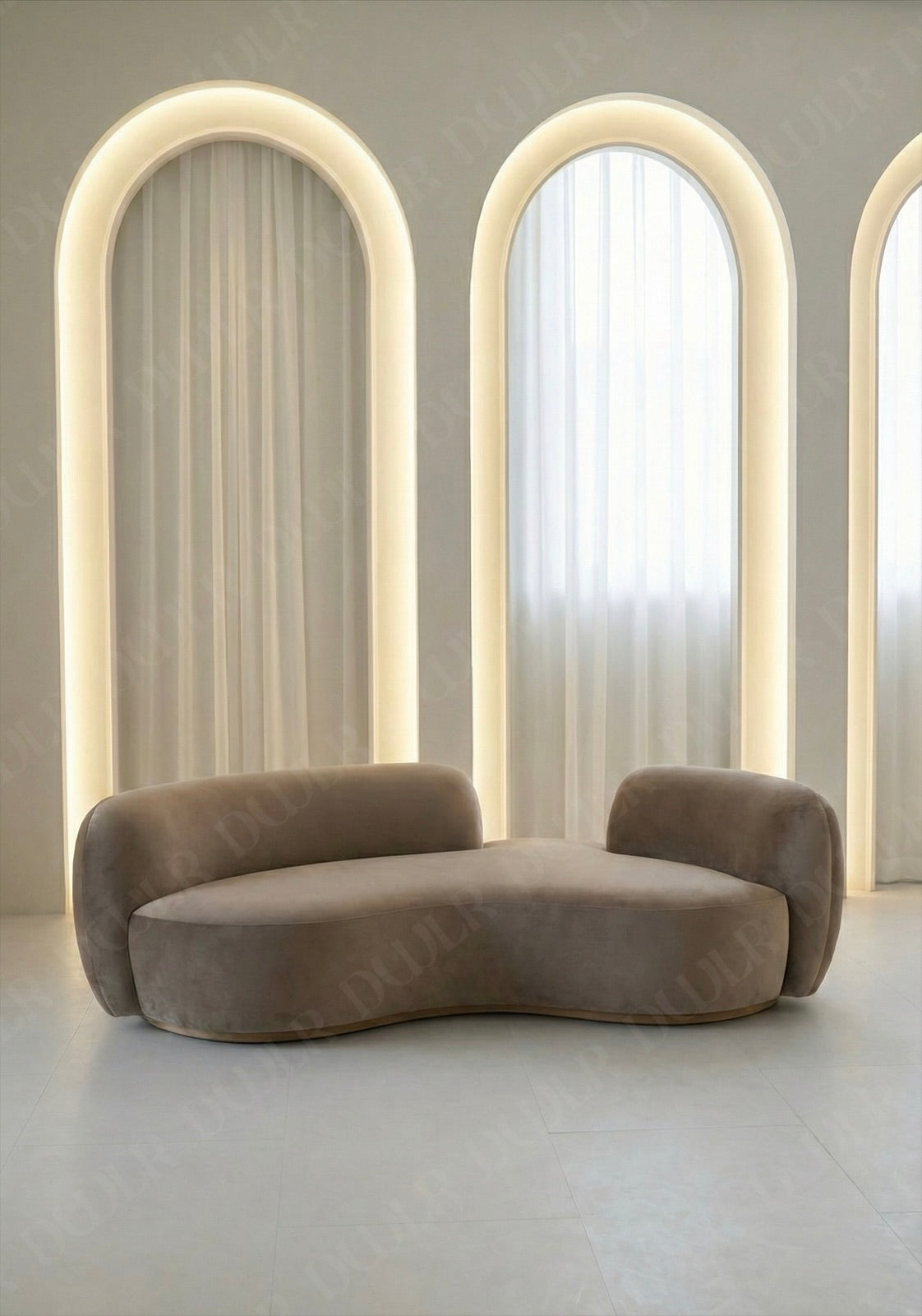 Bera sofa in taupe velvet upholstery with curved silhouette and low profile design, without integrated side table