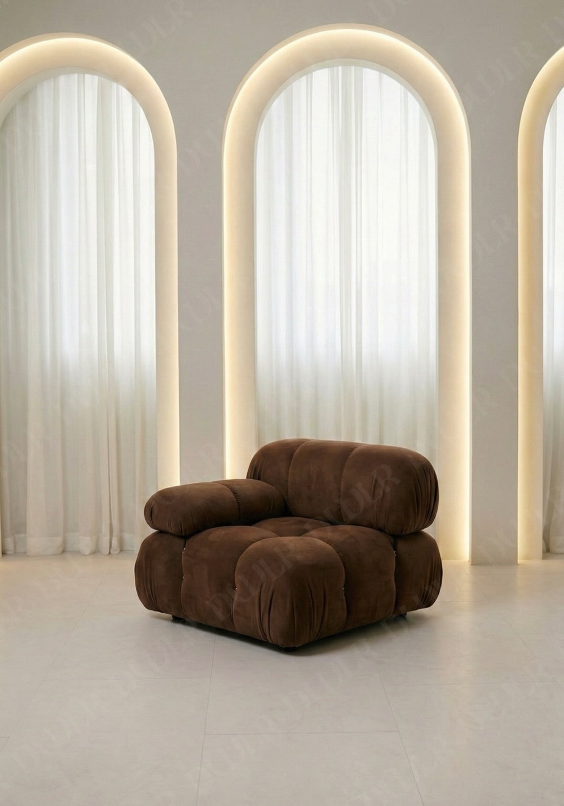 Cierra modular seat with backrest and low armrest in brown suede upholstery designed for flexible seating layouts