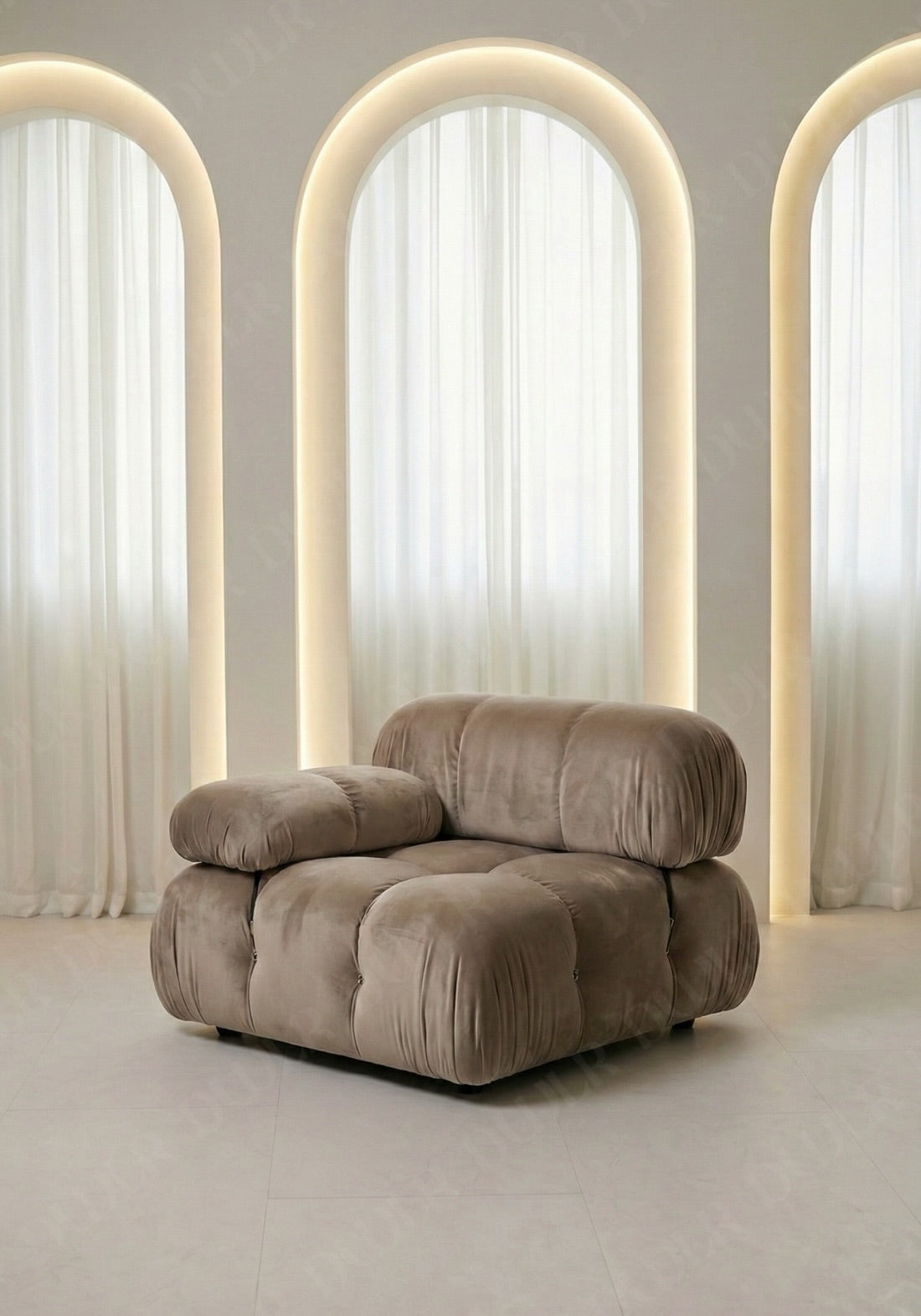 Cierra modular seat with backrest and low armrest in taupe upholstery designed for flexible seating layouts