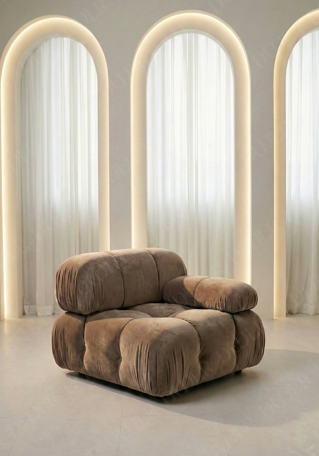 Cierra modular seat with backrest and low armrest in taupe upholstery designed for flexible seating layouts