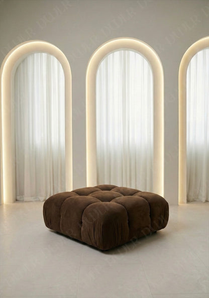 Cierra modular ottoman upholstered in fabric designed to be used as footrest or seating extension