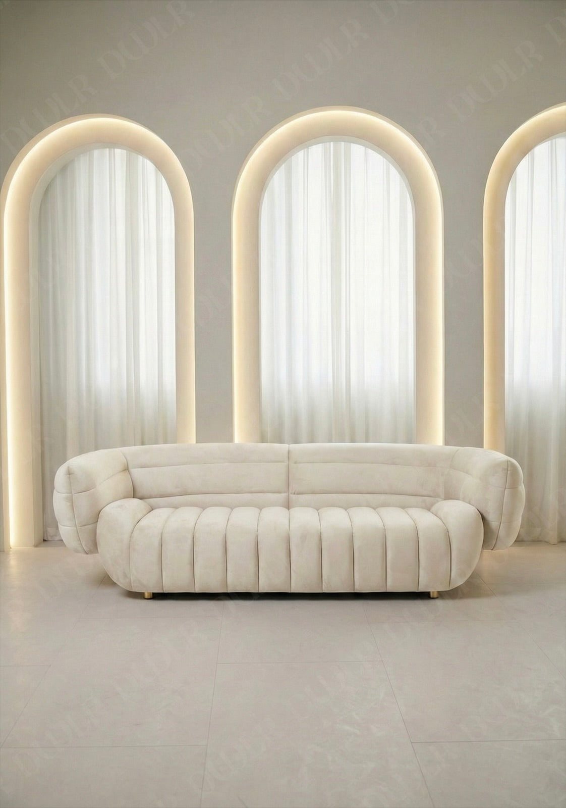 Solara sofa in off white velvet upholstery with curved silhouette and channel tufted seat in modern living room