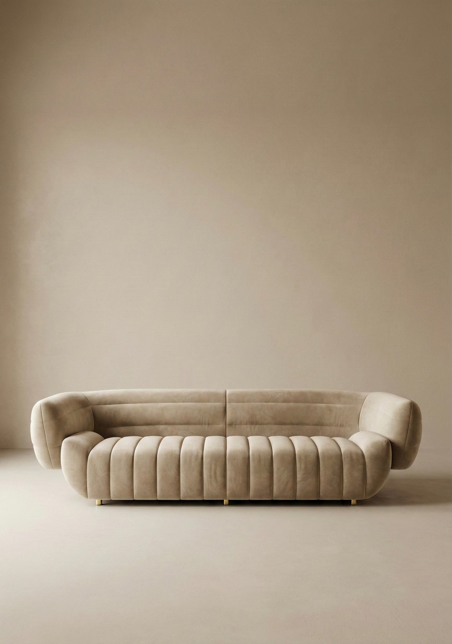 Solara sofa in beige velvet upholstery with curved silhouette and channel tufted seat in modern living room